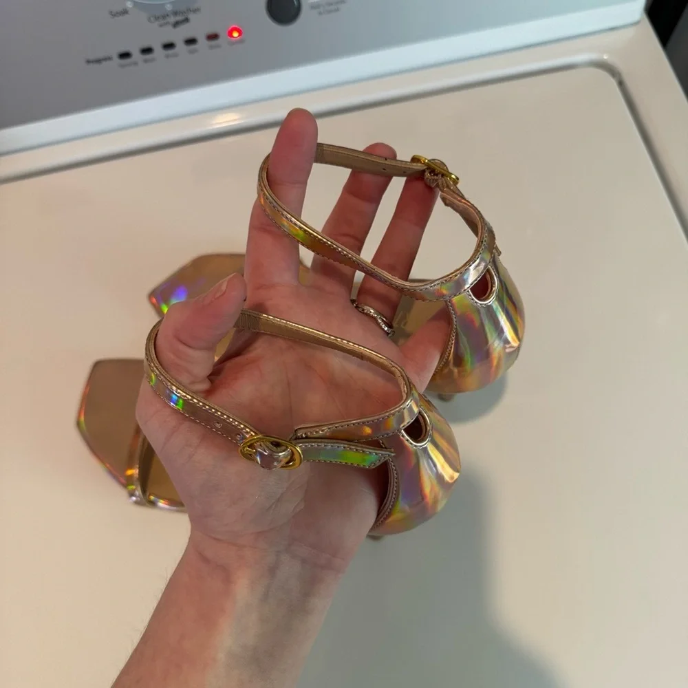 Stuart Weitzman Nudistcurve 100 Ankle Strap Heel Rose Gold Metallic Hologram